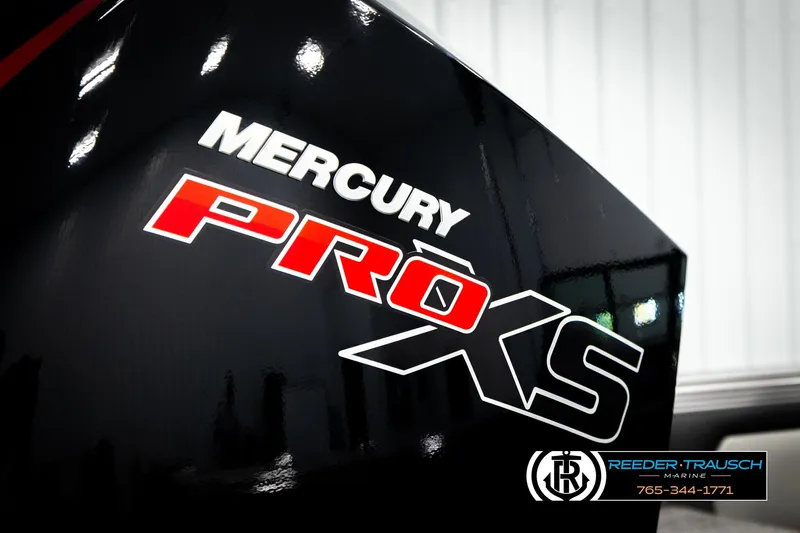 Slide: The Image of Mercury Pro XS engine on 2026 Lund 1975 Tyee boat, Reeder-Trausch Marine logo visible. - 52