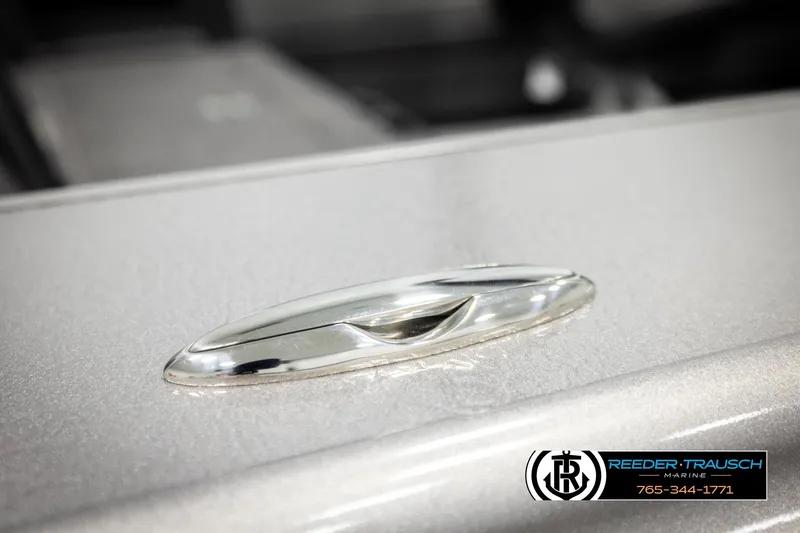Slide: The Image of Close-up of 2026 Lund 1975 Tyee boat detail with Reeder-Trausch Marine logo. - 61