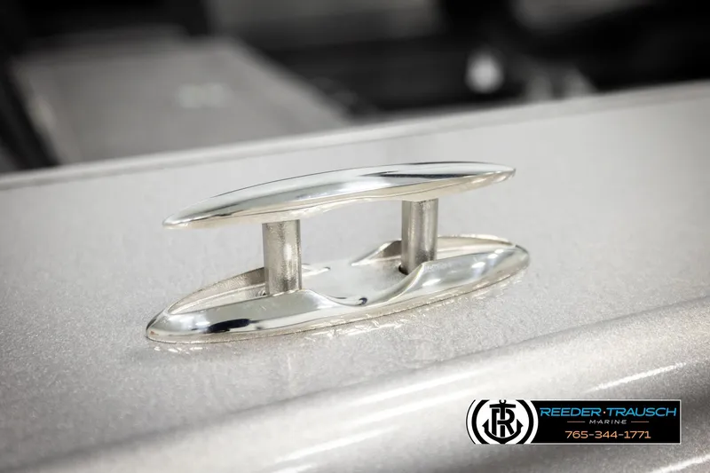 Slide: The Image of Chrome cleat on 2026 Lund 1975 Tyee boat, Reeder-Trausch Marine logo visible. - 62