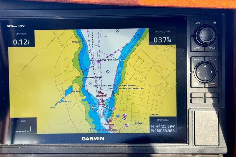 Slide: The Image of Garmin GPS display on Ranger 27 boat, showing nautical map and coordinates. - 59