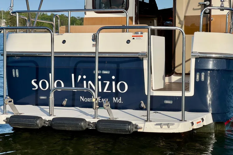 Slide: The Image of Stern view of 2012 Ranger 27 boat named "solo l'inizio" in North East, Maryland. - 92