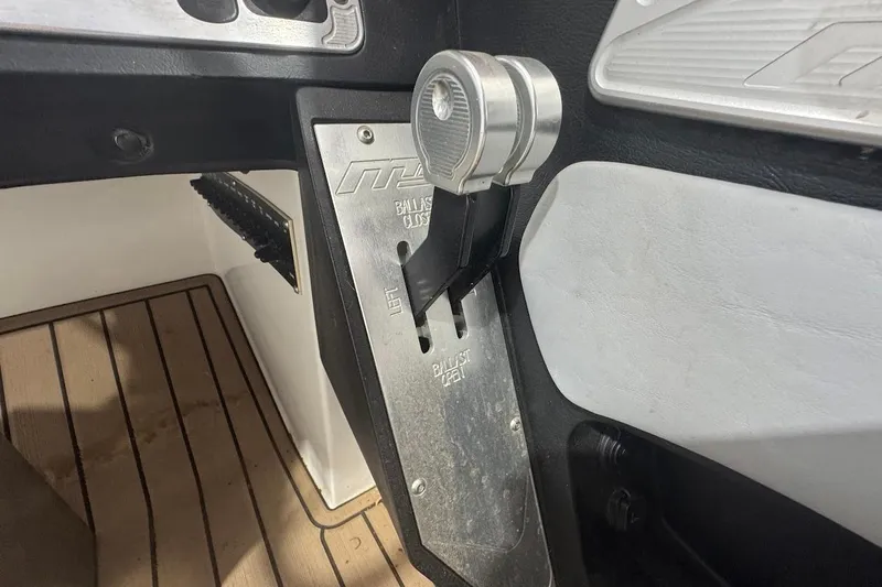 Slide: The Image of 2019 MB F22 Tomcat interior with ballast control lever and wooden flooring. - 10