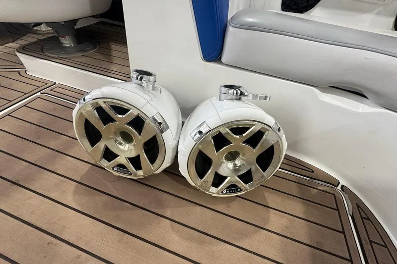 Slide: The Image of Two Exile audio speakers on a 2019 MB F22 Tomcat boat deck. - 16