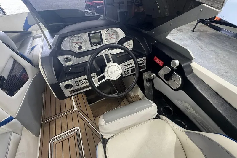 Slide: The Image of Interior of 2019 MB F22 Tomcat boat with modern dashboard and steering wheel. - 24