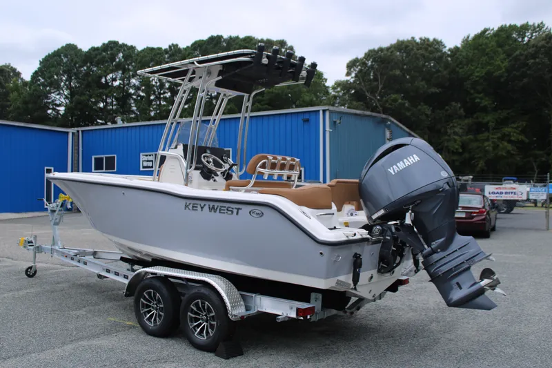 Slide: The Image of 2026 Key West 203 FS boat console with steering wheel and controls. - 6