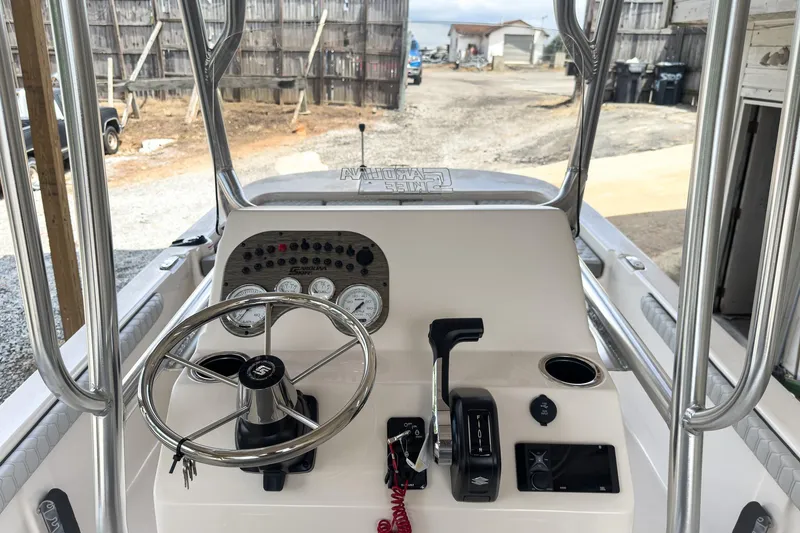 Slide: The Image of 2026 Carolina Skiff 23 LS boat interior with seating and storage compartments. - 12