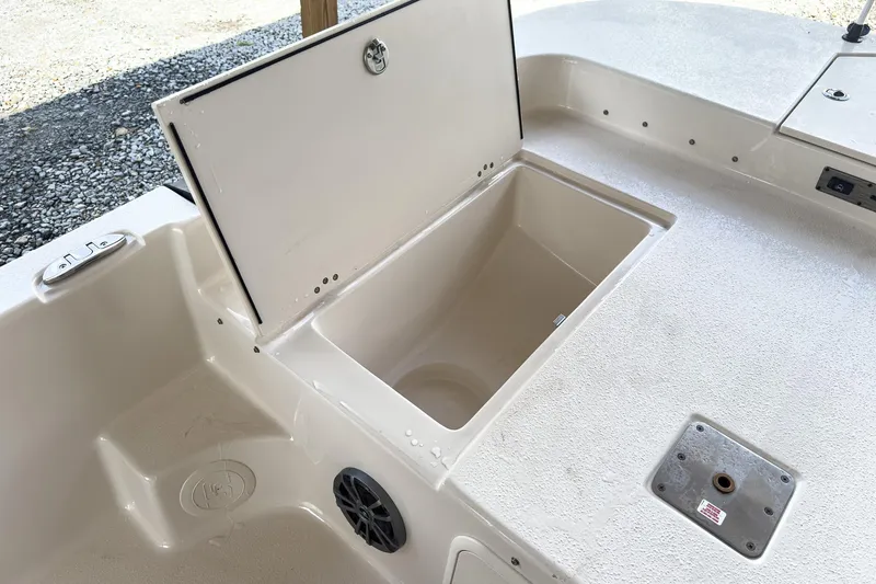 Slide: The Image of 2026 Carolina Skiff 23 LS boat interior with steering console and seating. - 17