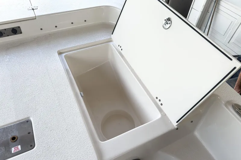 Slide: The Image of 2026 Carolina Skiff 23 LS boat console with steering wheel and controls. - 18