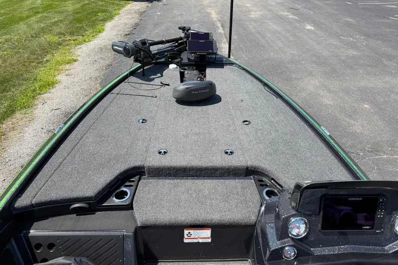 Slide: The Image of 2023 Nitro Z19 boat deck with fishing equipment and navigation system. - 21