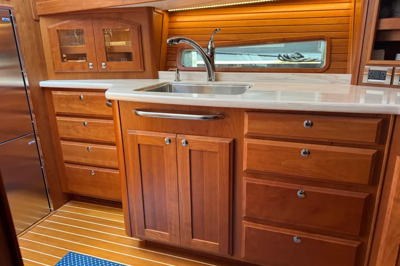 Slide: The Image of Luxurious wooden kitchen interior of 2022 Sabre 48 Salon Express yacht. - 41