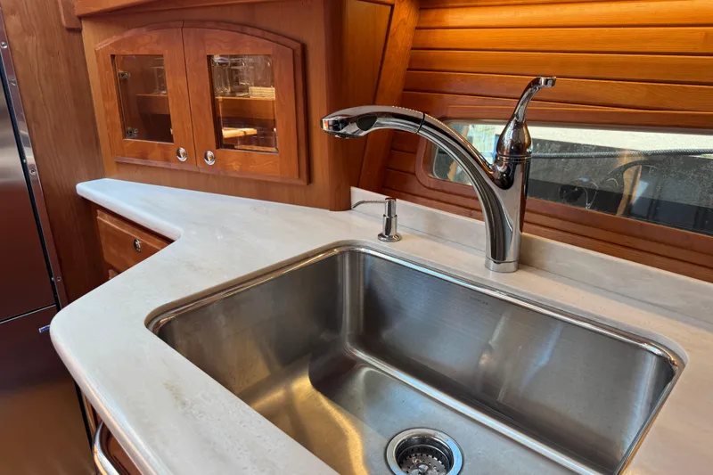 Slide: The Image of Luxury kitchen sink in 2022 Sabre 48 Salon Express yacht interior. - 42