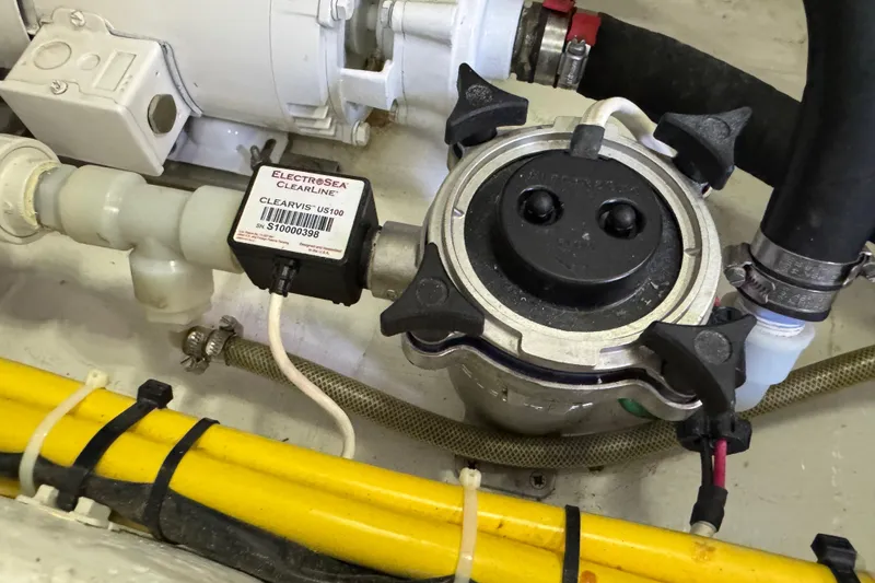 Slide: The Image of Engine compartment of 2022 Sabre 48 Salon Express with ElectroSea ClearLine system. - 74