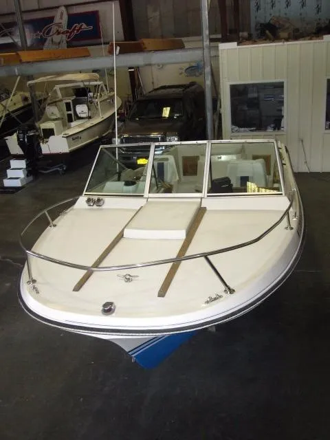 Slide: The Image of 1987 Wellcraft Step V 20 boat in showroom, front view. - 6