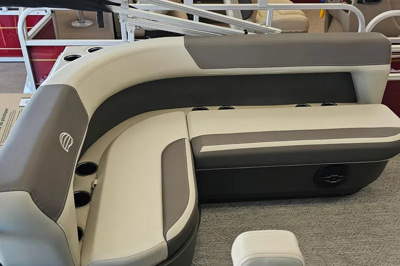 Slide: The Image of Luxurious seating on 2026 Sun Tracker BB-16 XL Select pontoon boat, featuring cup holders. - 12