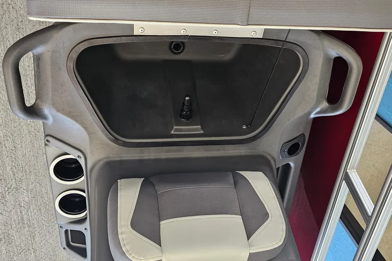 Slide: The Image of Interior of 2026 Sun Tracker BB-16 XL Select boat with seating and cup holders. - 7