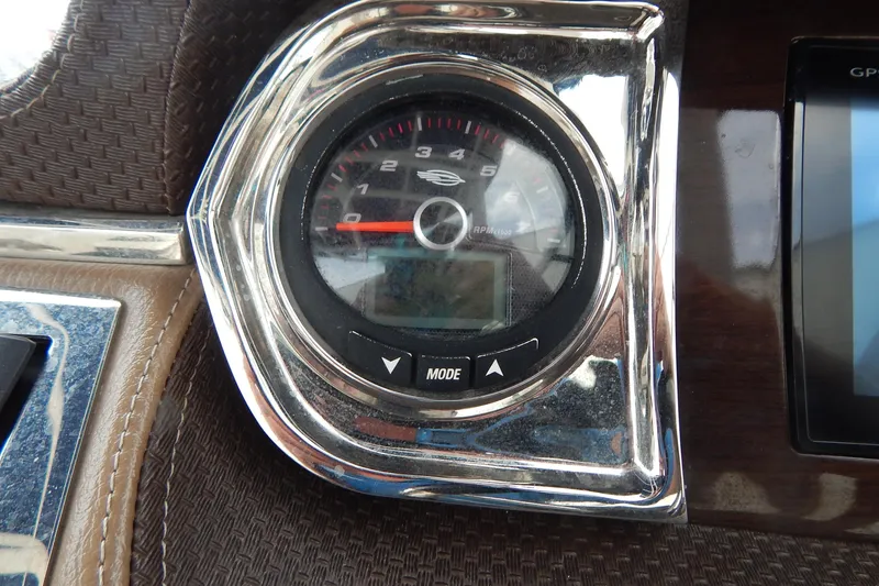 Slide: The Image of Close-up of 2016 Chaparral 277 SSX tachometer with chrome trim and digital display. - 20