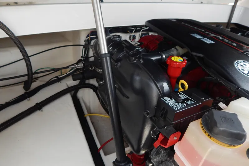 Slide: The Image of Engine compartment of 2016 Chaparral 277 SSX boat, showcasing detailed components. - 42
