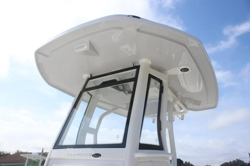 Slide: The Image of 2026 Tidewater 2500 Carolina Bay boat cockpit with modern steering and controls. - 20