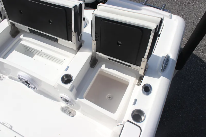 Slide: The Image of 2026 Tidewater 2500 Carolina Bay boat interior with stylish seating and Yamaha engine. - 30