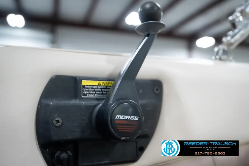 Slide: The Image of Throttle control lever on a 1998 Regal 1700 LSR boat, featuring Morse branding. - 36
