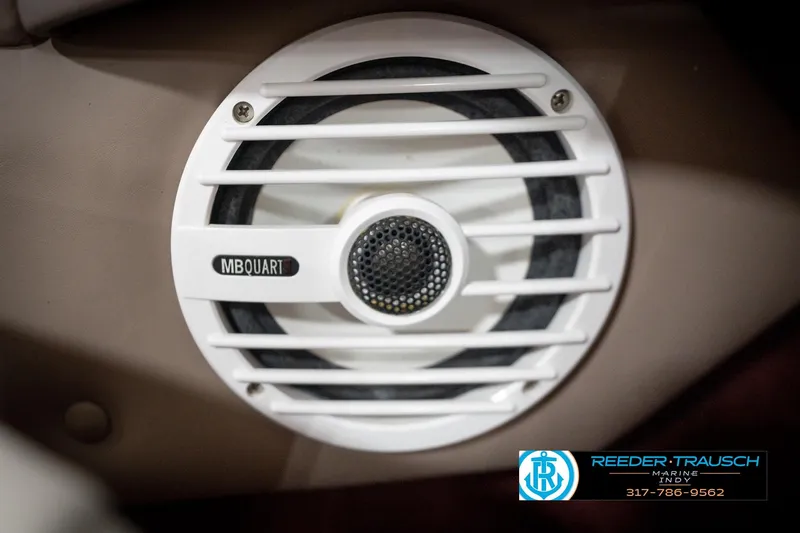Slide: The Image of White MB Quart speaker in a 1998 Regal 1700 LSR boat interior. - 40