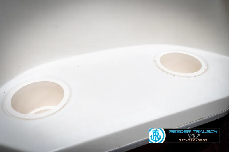 Slide: The Image of 1998 Regal 1700 LSR boat cup holders, close-up view. - 42