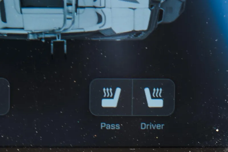 Slide: The Image of 2023 MasterCraft XStar heated seat controls for passenger and driver. - 10