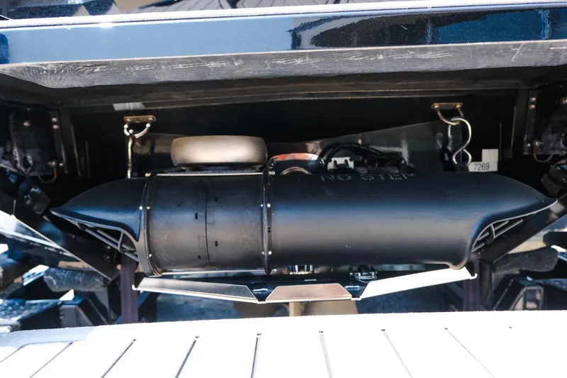 Slide: The Image of 2023 MasterCraft XStar boat exhaust system close-up. - 31
