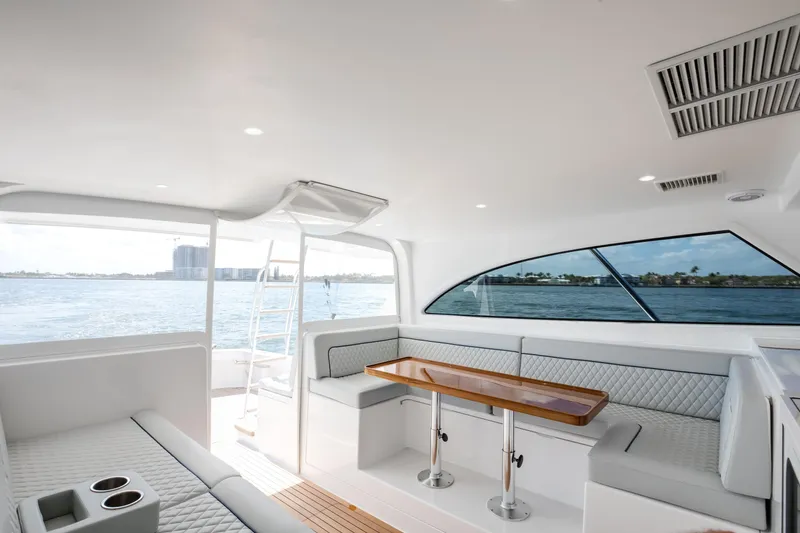 Slide: The Image of Luxurious interior of 2023 Viking 46 Billfish yacht with elegant seating and ocean view. - 15