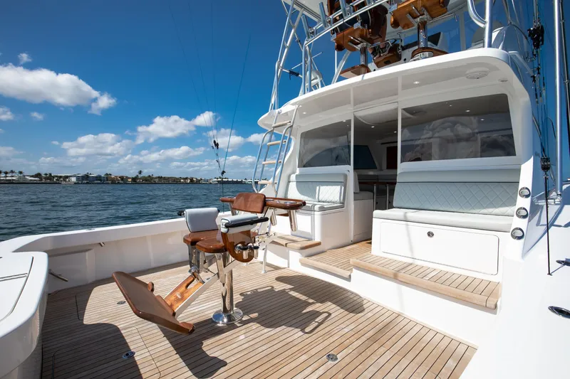 Slide: The Image of 2023 Viking 46 Billfish yacht deck with fishing chair and ocean view. - 19