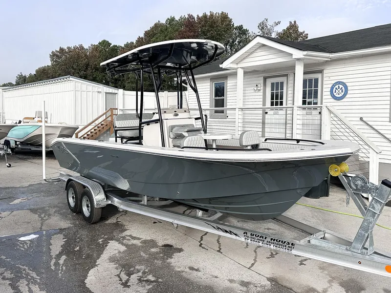 Slide: The Image of 2026 Carolina Skiff 22 Ultra Elite boat displayed at an indoor exhibition. - 20