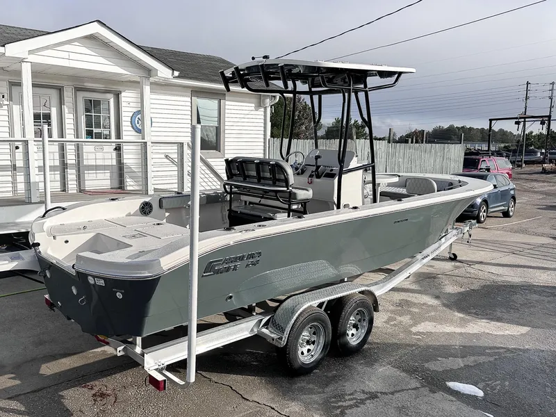 Slide: The Image of 2026 Carolina Skiff 22 Ultra Elite boat displayed at an indoor exhibition. - 21