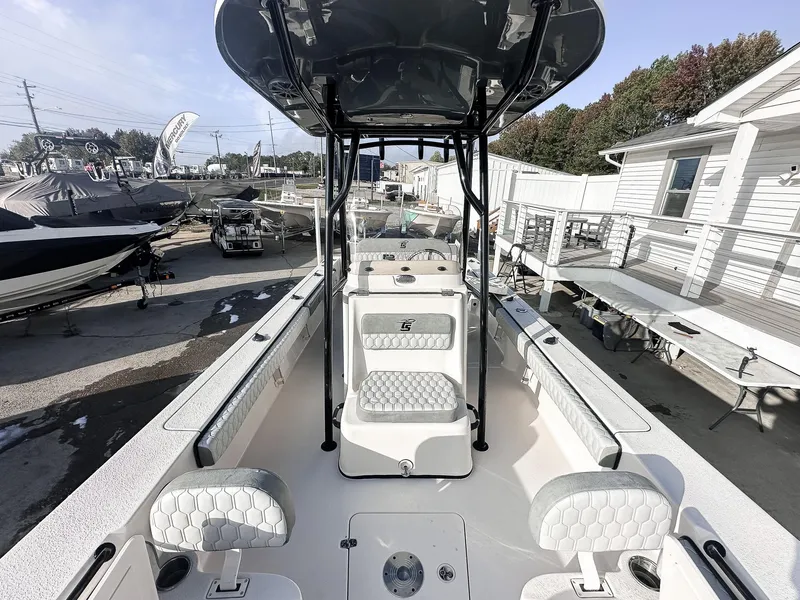 Slide: The Image of 2026 Carolina Skiff 22 Ultra Elite boat seat and deck, featuring storage compartments. - 38