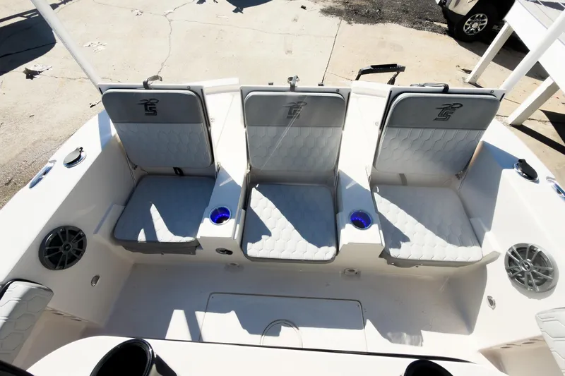 Slide: The Image of 2026 Carolina Skiff 22 Ultra Elite boat seating area with three cushioned seats. - 40