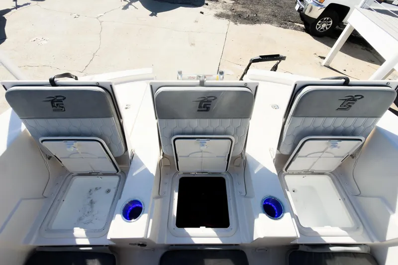 Slide: The Image of 2026 Carolina Skiff 22 Ultra Elite boat seating and storage compartments. - 41