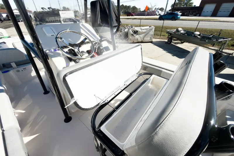 Slide: The Image of 2026 Carolina Skiff 22 Ultra Elite boat interior with open storage compartment. - 51