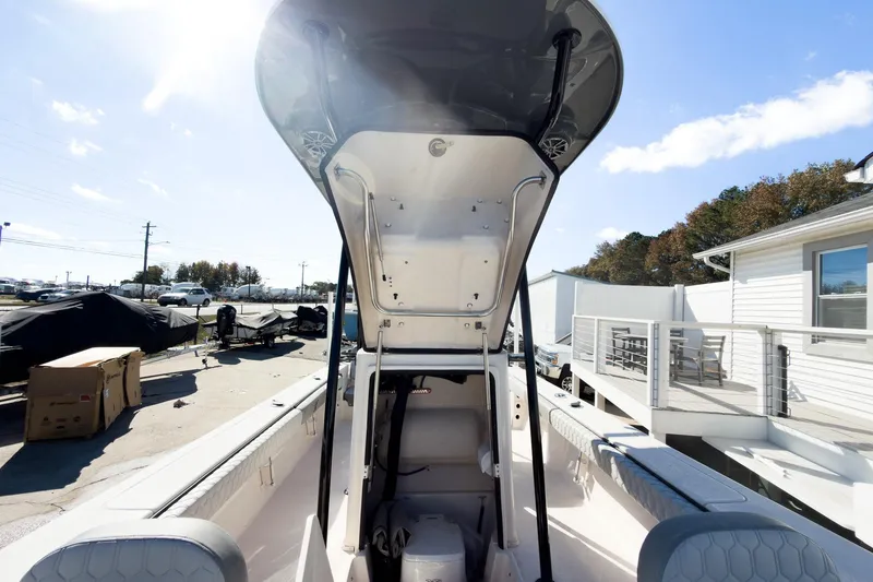 Slide: The Image of 2026 Carolina Skiff 22 Ultra Elite boat interior under sunny sky. - 64