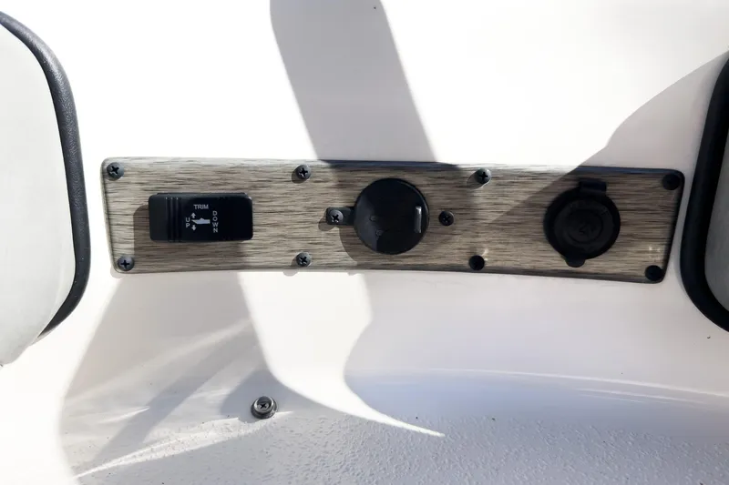 Slide: The Image of Control panel of 2026 Carolina Skiff 22 Ultra Elite boat with trim switch. - 70