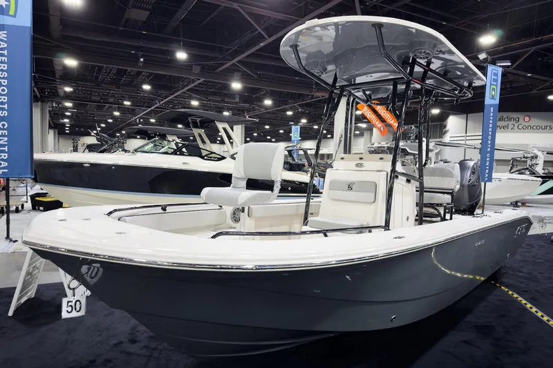 Slide: The Image of 2026 Carolina Skiff 22 Ultra Elite boat displayed at indoor exhibition. - 71