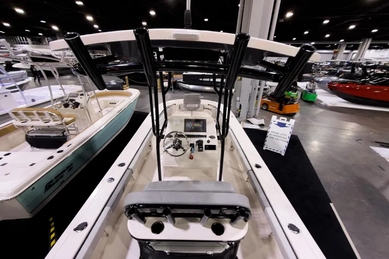 Slide: The Image of 2026 Carolina Skiff 22 Ultra Elite boat interior at a showroom display. - 75