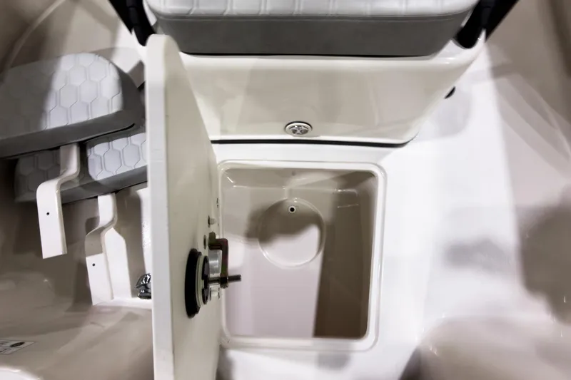 Slide: The Image of 2026 Carolina Skiff 22 Ultra Elite boat storage compartment and seating detail. - 84