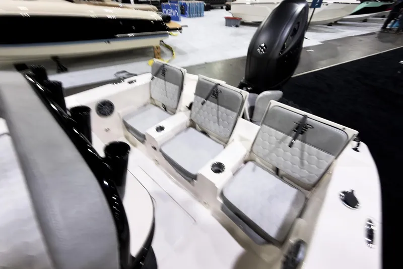 Slide: The Image of 2026 Carolina Skiff 22 Ultra Elite boat interior with cushioned seating and modern design. - 87