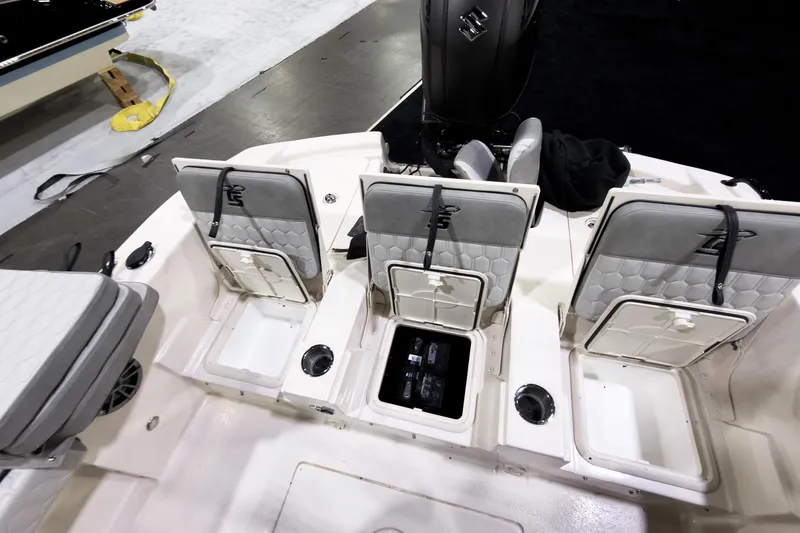Slide: The Image of 2026 Carolina Skiff 22 Ultra Elite boat interior with storage compartments and seating. - 88