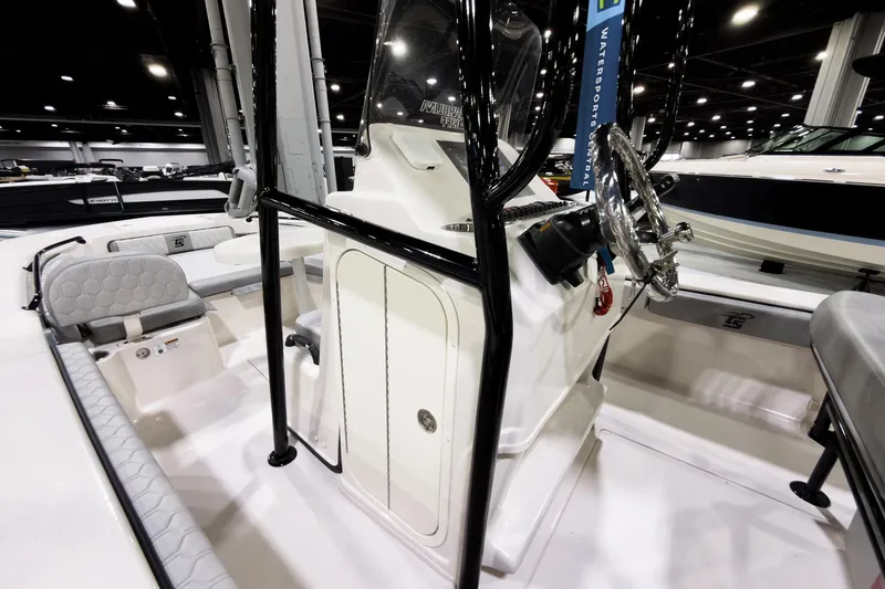 Slide: The Image of 2026 Carolina Skiff 22 Ultra Elite boat interior with steering console and seating. - 89