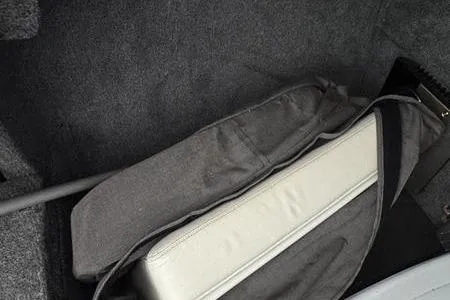 Slide: The Image of 2007 Cobalt 302 interior storage with gray carpet and seat cushion. - 38