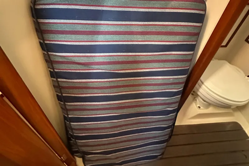 Slide: The Image of Striped cushion in the cabin of a 1989 Nonsuch 36 sailboat. - 46