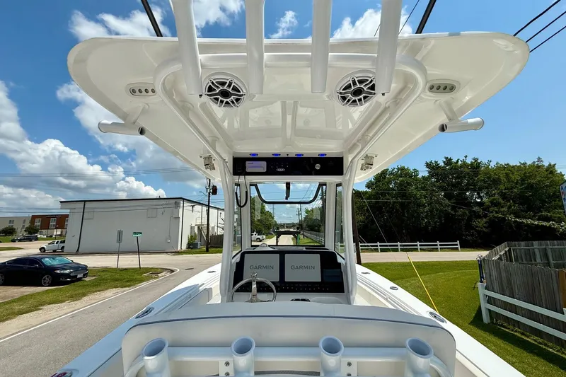 Slide: The Image of 2026 Sea Hunt Gamefish 27 Coffin Box boat with Garmin electronics, viewed from the helm. - 12