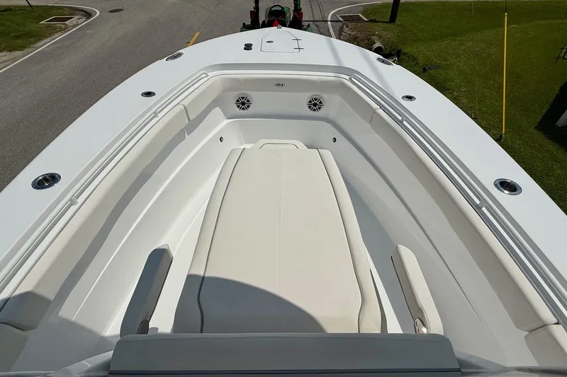 Slide: The Image of 2026 Sea Hunt Gamefish 27 Coffin Box boat interior with seating and speakers. - 15