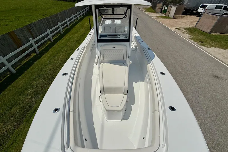 Slide: The Image of 2026 Sea Hunt Gamefish 27 Coffin Box boat, sleek design, spacious deck, white finish. - 17