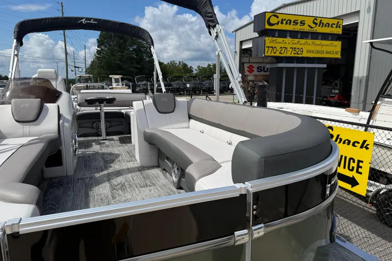 Slide: The Image of 2022 Avalon Catalina VRL 25' pontoon boat with luxurious seating at Grass Shack dealership. - 12
